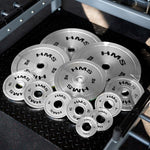 TOS Komplekts Kalibrēts metāls Olimpiskie svaru diski  2 x 0.25 - 25 KG (168 KG) HMS