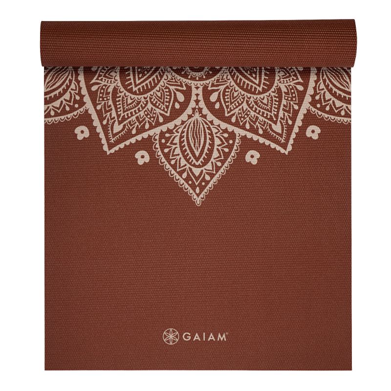 Gaiam Intense Rust Saules pulksteņa ziedu jogas paklājiņš 5mm 65733